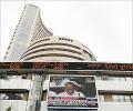 Markets bounce back, Sensex ends up 405 points