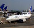 Indian held in US for sexually assaulting fellow passenger on plane