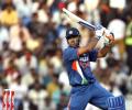 Dhoni's century sets up big win for India