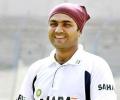 Dhoni loses top spot, Sehwag rises in ODI rankings