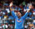 Yuvraj's fine all-round show douses Irish fire