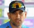 Dhoni 'wary' of dew factor, could bowl first