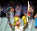 India stage late fightback after Warner's century on Day 1