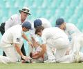 Australia batsman Hughes continues to fight for life