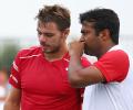 Paes-Wawrinka fight back from a set down to advance at Cincinnati