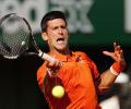 Wawrinka beats Tsonga to make French Open final; Djokovic-Murray semi to resume on Saturday