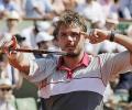 Wawrinka faces boos after beating local boy Tsonga