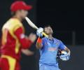 PHOTOS: Raina ton stretches India's unbeaten run in World Cup