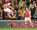 EPL PHOTOS: Arsenal coast past Hull, close in on Champions League berth