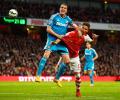 EPL PHOTOS: Sunderland eke out draw at Arsenal, avoid relegation threat