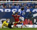 Dortmund twice squander lead in draw at Schalke