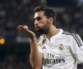 Arbeloa and Pique in war of words as title race heats up