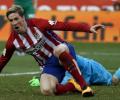 Torres reaches century, Atletico keep pressure on Barca