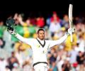 PHOTOS: Khawaja's unbeaten century gives Australia the lead