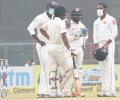 Sri Lanka go behind masks after Kohli's record double