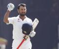 Pujara's defiant ton holds India's innings together