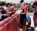 This cricketer distributes food, water to migrants