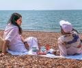 Mayank and Missus enjoy Brighton Beach