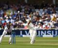 Cheers! Mitchell makes a splash with a six into fan's beer glass