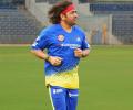 Dhoni Unveils Retro Look: Back to Long Hair, Bandanas