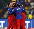 IPL PIX: Spirited RCB knock out CSK; qualify for play-offs!