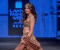 WATCH: Kriti turns boho bride in gold bralette