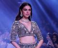 Try not to drool! Aditi bares curves on the ramp