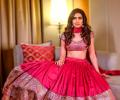 What will Karishma wear to her wedding?