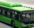 Going green: Take the bus or buy a hybrid car? 