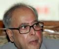 Economy is in right direction, says Pranab