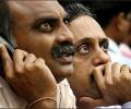 Sensex ends below 27K; banks, auto fall, metals shine