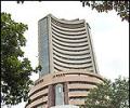 Sensex closes above 19K, heavyweights rally