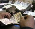 Rupee snaps 2-week rise; down 25 paise to 66.46