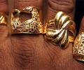 FM wants curbs on gold import to continue