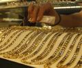 Gold climbs Rs 340 to over 2-month high as buying spikes