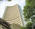 Sensex sheds 136 points to end below 26,000