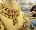 Gold, silver fall on global cues, low demand