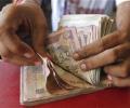 Rupee rises to near three-month peak