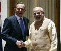 Modi and Abbott target free trade pact, sign 5 deals