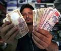 Rupee rises 8 paise to end at 60.84 versus dollar