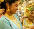 Gold glitters on Dhanteras buying, global cues