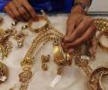 Gold drops Rs 110 on easing demand from jewellers