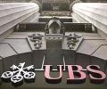 Swiss banks' profit rises; staff count down