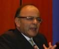 Jaitley talks tough on black money, sells India story