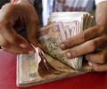 Rupee falls for 4th day vs dollar, eases 2 paise