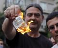 Greece imposes capital controls as crisis deepens