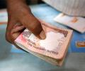 Rupee hits 1-month high of 67.05, up 13 paise