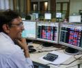 Market takes poll position, Sensex surges 301 points