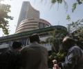 Sensex settles 267 points lower, Nifty below 9,300