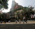 Sensex ends higher, Nifty slips below 9,450